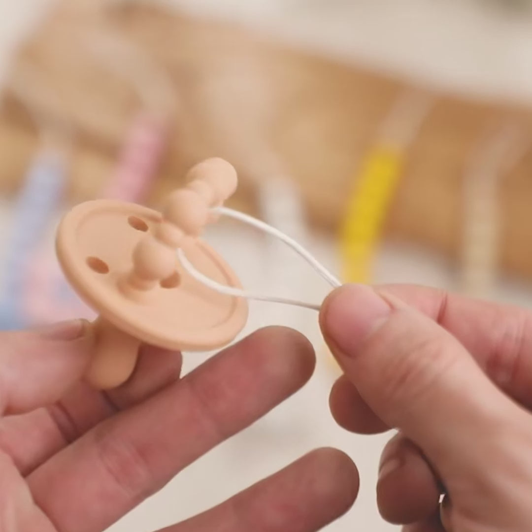 Attache Tetine - produit premium pour bébé